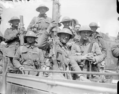 Image © IWM (Q 5240) - British troops embussing in Arras to go back for a rest, May 1917.